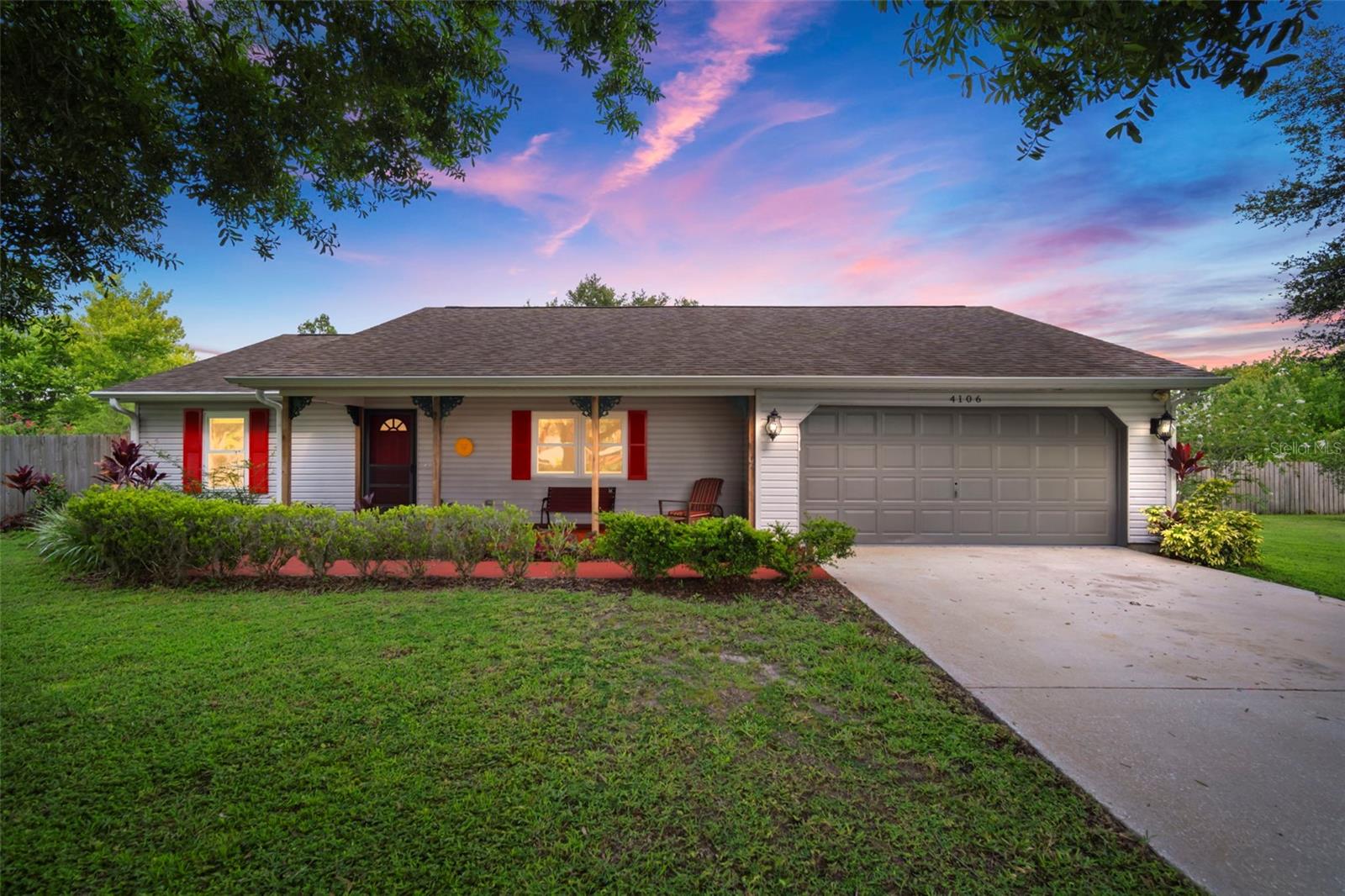 Your own private homestead retreat on 2.6 acres in Plant City! Here is a rare opportunity to own a peaceful slice of country paradise on a sprawling 2.6-acre parcel. Tucked away at the end of a quiet street with limited neighbors, this charming three-bedroom, two-bathroom home offers privacy, serenity, and self-sufficiency in an idyllic rural setting. Step inside to find beautiful luxury vinyl plank flooring throughout, a meticulously-maintained open floor-plan interior, and an upgraded electrical panel with a whole-home generator hookup for peace of mind. The oversized screened-in patio provides a perfect space for relaxing or entertaining, with views of your expansive backyard oasis. Outdoors, this property truly shines! The fully fenced yard includes a raised wooden deck, a large gazebo, a dedicated chicken coop, and a separate workshop with garage door—perfect for hobbyists, homesteaders, or anyone needing functional space. There is also a pole barn with even more room for all your toys, equipment, trailers, or recreational vehicles—no HOA restrictions to limit your lifestyle. For green thumbs and gardening enthusiasts, the land is bursting with potential. The established garden cultivates a wide variety of crops including arugula, beets, broccoli, cabbage, carrots, collard greens, corn, eggplant, green beans, onions, kale, lettuce, peppers, peas, okra, sweet potatoes, and even peanuts—just to name a few. An abundance of fruit trees dot the landscape, creating your very own private orchard. Additional upgrades include hurricane-impact windows with a transferable warranty, new water heater, newer roof and air conditioning systems, a spacious two-car garage, iron-filter and water softener. Whether you're looking for a self-sustaining homestead, less restrictions on your lifestyle, or just more space to roam, this unique property is the perfect blend of functionality, freedom, and Florida country charm. Call today to schedule your private showing!
