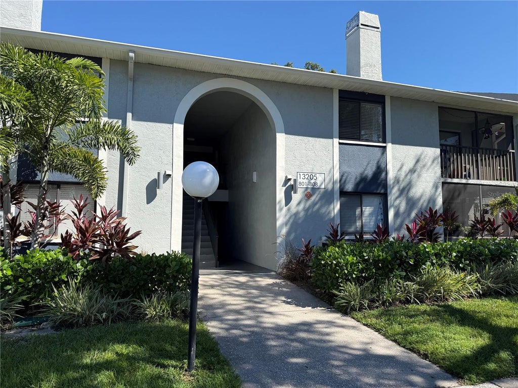 Photo of 13205 Whispering Palms Place SW #806, Largo, FL 33774 (MLS # TB8558156)
