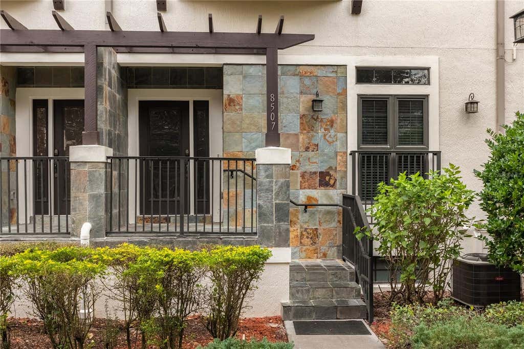 Photo of 8507 Kediaman Avenue #8507, Orlando, FL 32821 (MLS # O6423903)