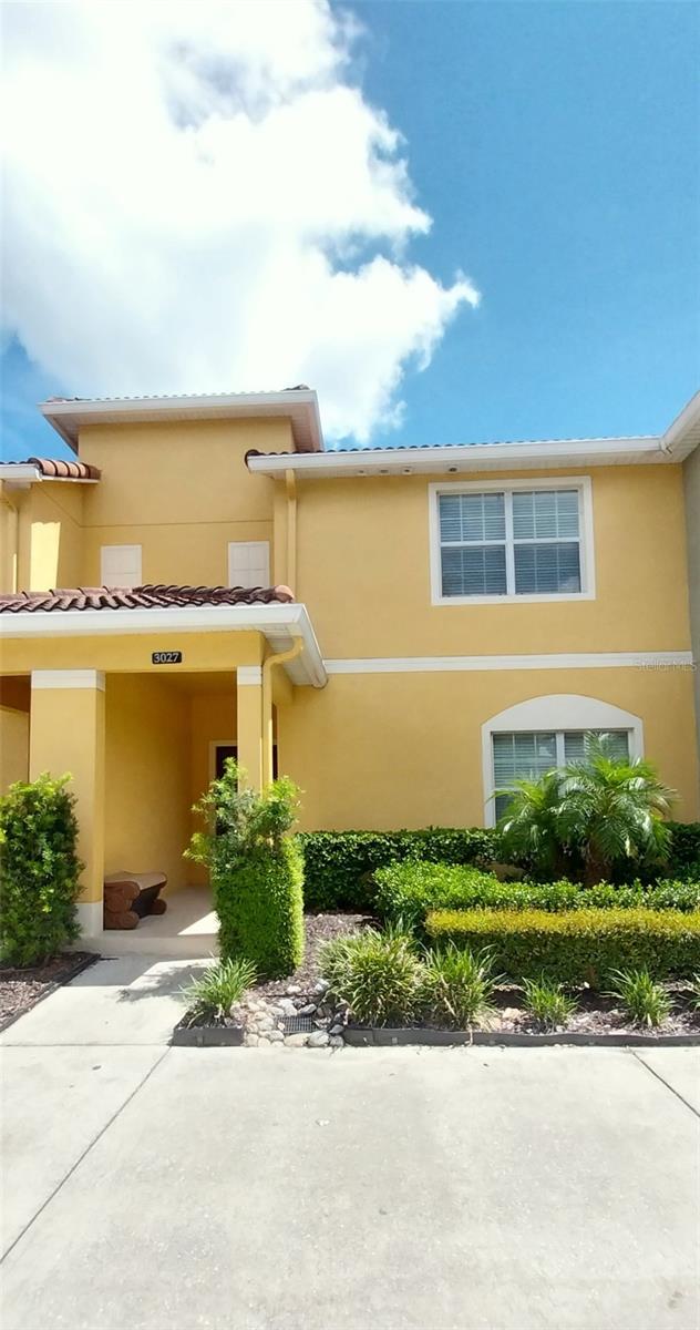 Photo of 3027 Beach Palm Avenue #3027, Kissimmee, FL 34747 (MLS # O6441687)