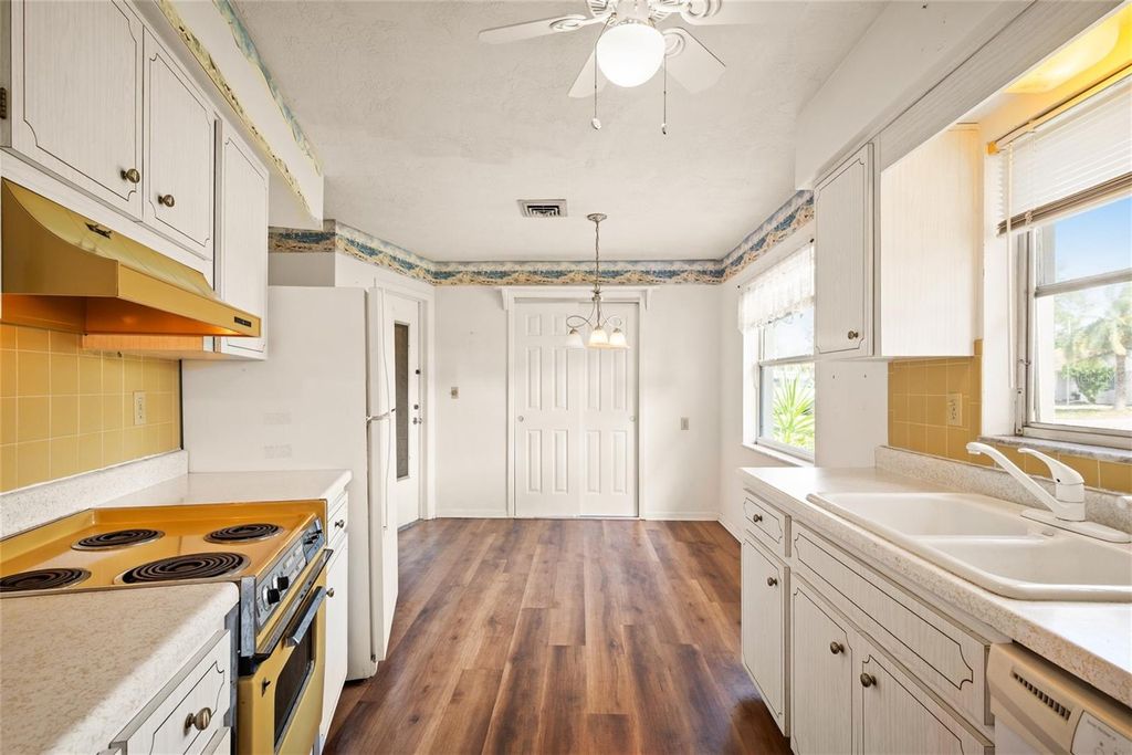 Photo of 6943 301st Avenue N, Clearwater, FL 33761 (MLS # A4689344)