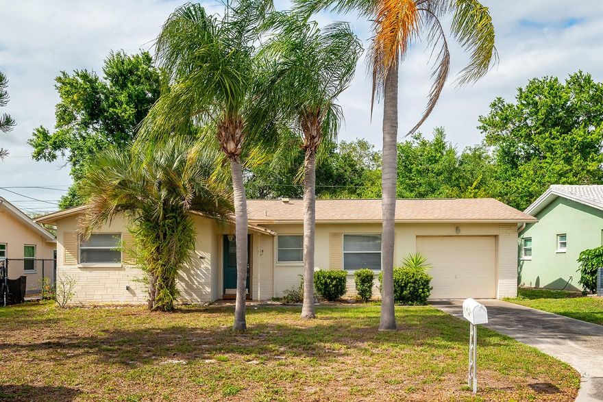 Charming 2-bedroom, 2-bath home with garage located in a highly convenient Clearwater location. Owned by the same family since the 1970s and primarily used as a seasonal getaway, this property presents a rare opportunity for its next owner to update and make it their own or move right in! The home offers solid fundamentals, including a 2020 roof and 2021 water heater, along with a layout full of potential. Unique vintage features, such as the original 1970s stove, add character and nostalgic appeal. The backyard provides a private and quiet setting, with mature vegetation creating natural screening, ideal for enjoying the outdoors. Conveniently situated near shopping, dining, parks, and major roadways, this property combines accessibility with a tucked-away feel. No HOA, no CDD, and the property is not located in a flood zone.