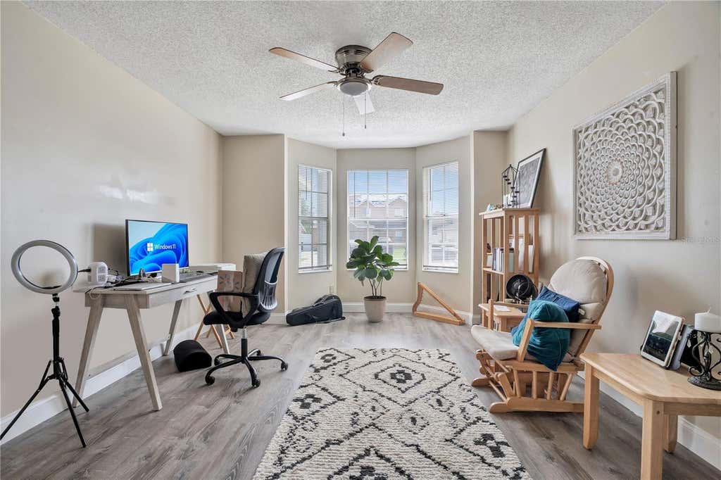 Photo of 13038 Los Angeles Woods Lane, Orlando, FL 32824 (MLS # S5153359)