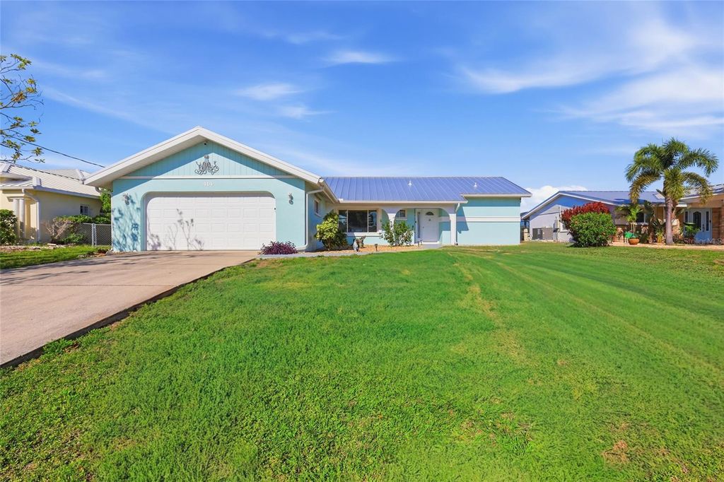 Photo of 414 Spring Lake Boulevard NW, Port Charlotte, FL 33952 (MLS # A4690380)