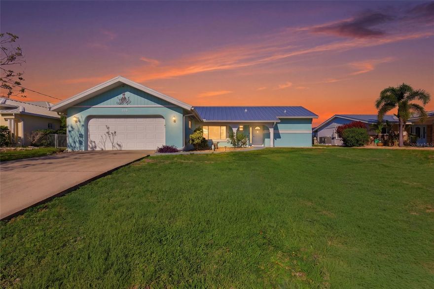 Spacious 2,000+ sq ft home with stunning views of Spring Lake. Ideal for in-law situation, kids that need extra space or vacation rental. It features 3 bedrooms, den, extra sitting room, 3 bathrooms, and separate living area. Large screened lanai with boat slip. 15-minute boat ride to Charlotte Harbor from the newer composite dock and slip. 2-car garage, great neighborhood, new metal roof (2023), dual air conditioners one from (2019). The salt water 10x40 heated pool is perfect for doing laps while watching the gorgeous sunsets on the Lake. New Pool Heater (2024) It is very tastefully furnished and being sold turnkey. New composite boat dock with designed to hold a 14,000 lb lift. Schedule your showing today!