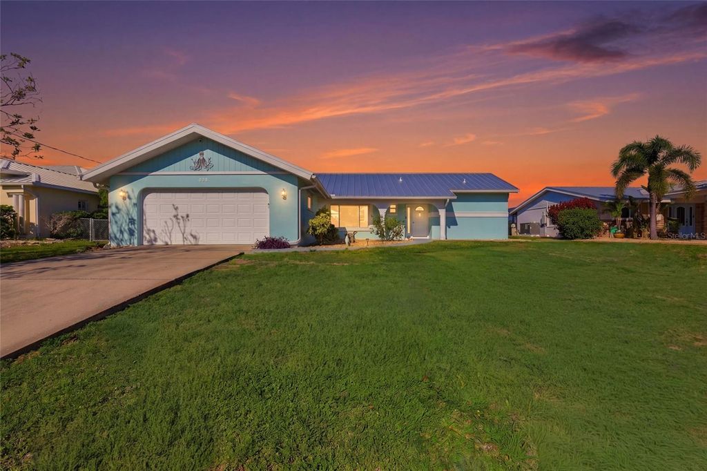 Photo of 414 Spring Lake Boulevard NW, Port Charlotte, FL 33952 (MLS # A4690380)