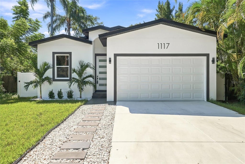Photo of 1117 15th Avenue NW, Largo, FL 33770 (MLS # TB8560176)