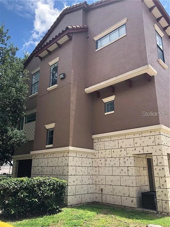 Photo of 6129 Metrowest Boulevard #101, Orlando, FL 32835 (MLS # O6437410)