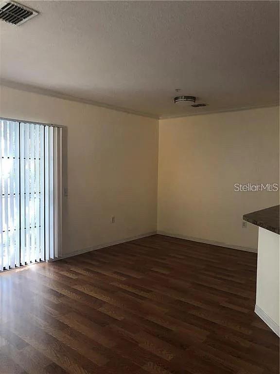 Photo of 6129 Metrowest Boulevard #101, Orlando, FL 32835 (MLS # O6437410)