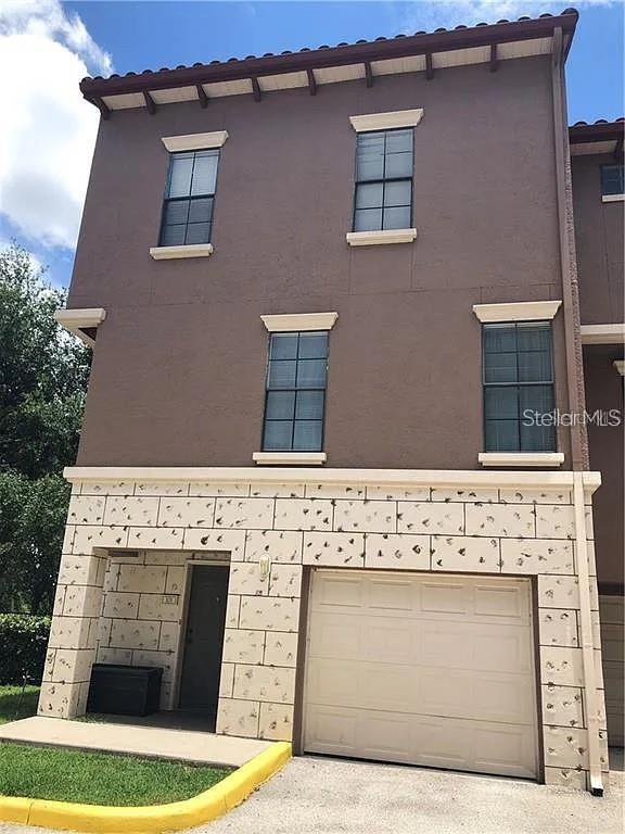 Photo of 6129 Metrowest Boulevard #101, Orlando, FL 32835 (MLS # O6437410)