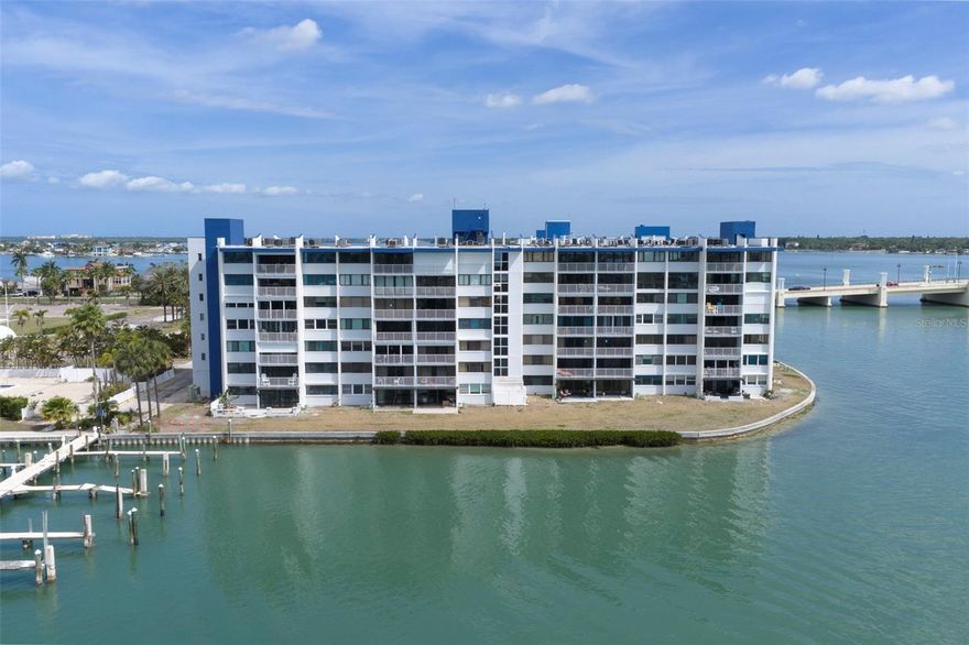 One or more photo(s) has been virtually staged. Enjoy the Florida lifestyle in this established waterfront community just a stroll from the sugary white sands beaches of Treasure Island. Offered within the Treasure Island Yacht and Tennis Club, this meticulously and completely renovated unit offers a bright and sunny open floorplan, with hurricane impact sliders leading to a unique outdoor patio area large enough for entertaining, gardening or just soaking in the Florida sunshine. A contemporary chefs kitchen with dazzling solid surface countertops and waterfall edge, includes custom cabinet pulls reminiscent of the colors of the sea, that emanates a true coastal vibe. A generously sized primary bedroom with 2 extra large wall to wall closets, plus linen closet space provides ample storage. An ensuite bath boasts a beautiful custom tiled walk-in shower. Just minutes from Sunset Beach, John’s Pass Village, restaurants, shopping, boating, and waterfront entertainment. An opportunity for a savvy buyer awaits in this established, well known community. Come experience waterfront living and our unforgettable Gulf Coast sunsets.