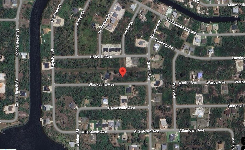 Photo of 13328 Waukesha Avenue, Port Charlotte, FL 33981 (MLS # D6148627)