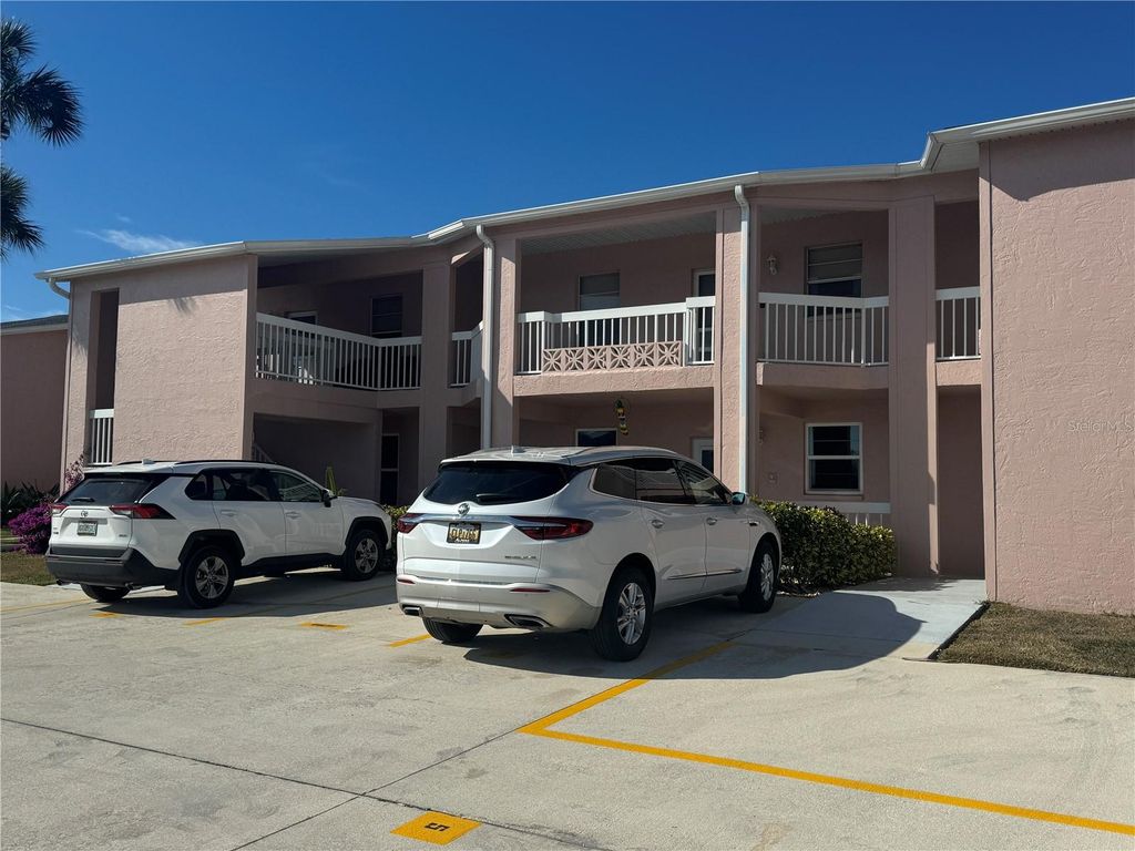 Photo of 177 Boundary Boulevard #5C, Rotonda West, FL 33947 (MLS # D6144492)