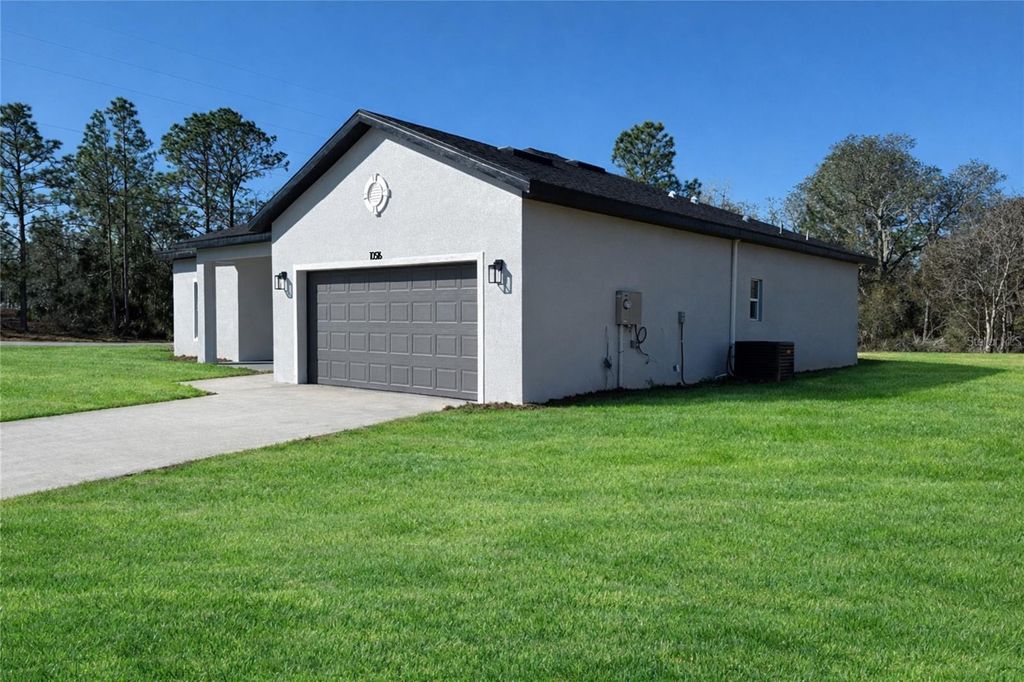 Photo of 10516 Caldera Ave Ave N, Citrus Springs, FL 34433 (MLS # O6381243)