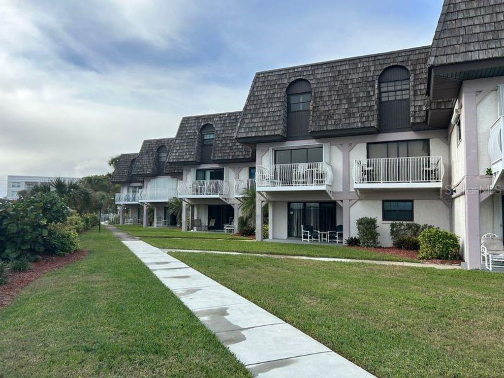 Photo of 5350 Ocean Beach Boulevard #210, Cocoa Beach, FL 32931 (MLS # O6367641)