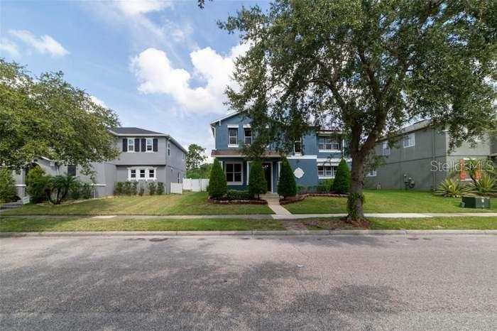 Welcome Home to this beautiful property nestled in the community of Avalon Park. Zoned highly for A+ schools in the 32828 area, including Avalon Elementary, Avalon Middle, and Timber Creek High School, this 3,227 sq ft home boasts 4 bedrooms, 2 1/2 baths, and a dedicated office space. Notably, the house is powered by solar, ensuring energy efficiency and impressively low electric bills. The home features a spacious open kitchen concept, equipped with stainless steel appliances, an elegant 18-inch backsplash, and luxurious granite countertops. Upstairs, the Primary Bedroom is complete with a sizable walk-in closet and a spa-like walk-in shower. The other upstairs bedrooms are equally inviting, adorned with new vinyl flooring and updated fixtures. Step outside to experience your personal Florida paradise, complete with a generous covered patio, luscious mango and guava trees, a hot tub and a secure fully fenced-in yard for added privacy. This remarkable residence is set on a picturesque conservation lot. With its stunning design, modern amenities, and energy-efficient attributes, this exceptional property eagerly awaits its new tenant! Don't miss this incredible opportunity to call it home. New pictures are coming this week