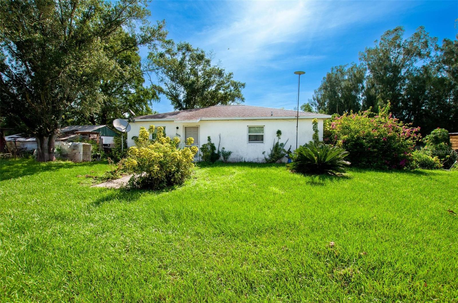 Great starter home and farm. This 2 bedroom 1 bath CBS construction home is located on just over 5 acres. Interior features include an open floor plan with ceramic tile flooring in the living areas and carpet in the bedrooms. Exterior amenities include a cross fence paddock, numerous animal enclosures, 3 barns, workshop/storage outbuildings and a stocked pond. This property has endless possibilities of country living yet located in close proximity to public amenities. Make an appointment to view this home today.