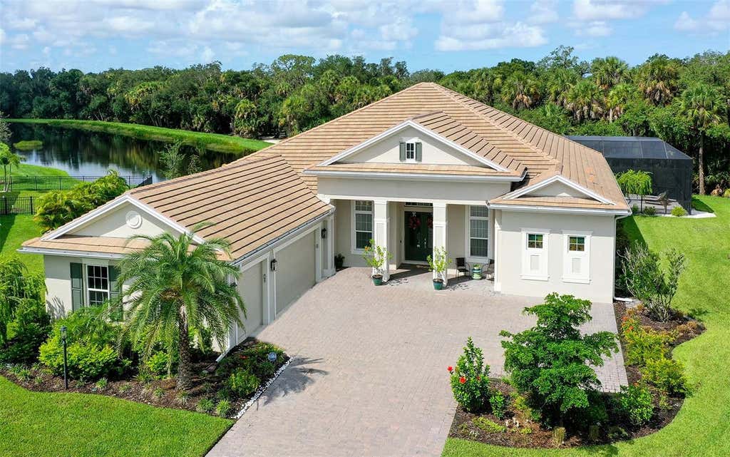 Photo of 9483 Tequila Sunrise Drive, Sarasota, FL 34241 (MLS # A4702636)