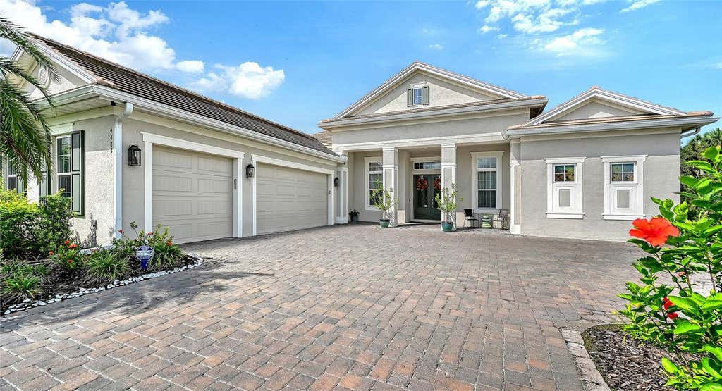Photo of 9483 Tequila Sunrise Drive, Sarasota, FL 34241 (MLS # A4702636)