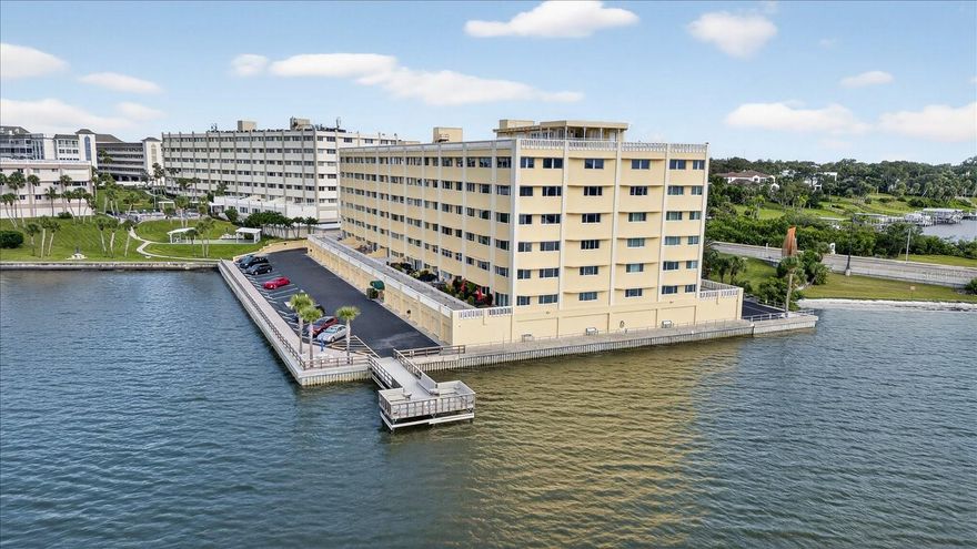 One or more photo(s) has been virtually staged. Discover beautiful water views and laid back coastal living at its finest in this beautifully updated 1-bedroom, 2-bath condo in Harbor Club 3. Step inside to a bright, airy living space, plantation shutters and an open floor plan designed for both comfort and entertaining. The spacious bedroom offers the convenience of an en-suite bath, while a second full bathroom ensures guests feel right at home. The recently renovated kitchen offers granite counter tops, high end appliances and a large breakfast bar. The windows are currently schedued to be repaced with high impact hurricane windows according to the seller This residence has had no storm damage, offering added peace of mind.  Ideally situated in Belleair Bluffs, you’ll be walking distance from sandy beaches, boutique shopping, and great dining. Boaters will also appreciate the nearby opportunity for a slip or lift. Schedule your private showing today and see why this location is so desirable!