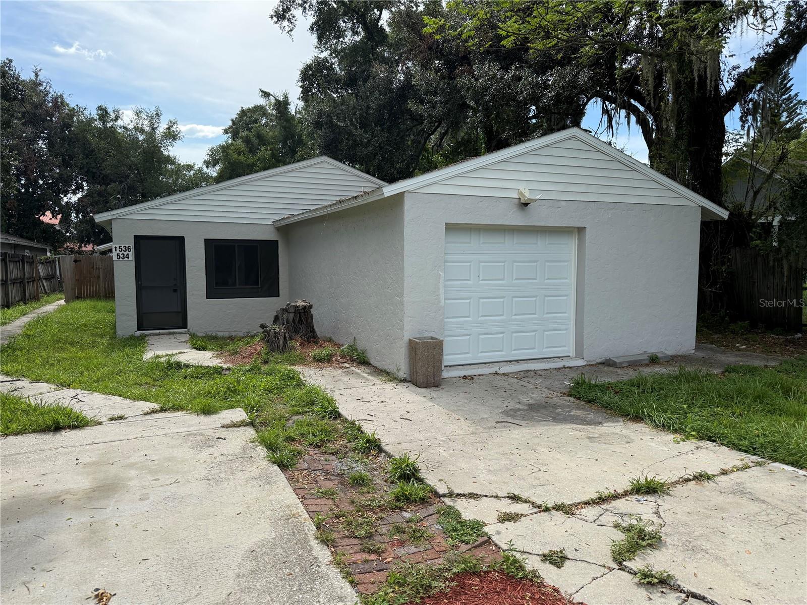 Investor special in the heart of Downtown Orlando! 534 Charles Court is a fully remodeled duplex offering immediate rental income opportunity plus untapped potential for even more. Each unit features 2 bedrooms, 2 bathrooms, and in-unit laundry—ideal layouts for long-term tenants or short-term rental opportunities. The front unit includes a large garage with the potential to convert into one or even two additional rooms. Out back, the second unit has a generously sized backyard—perfect for adding a third unit or ADU. These rare value-add opportunities make this property a standout in the downtown market. Major updates are already done: new roof (2017), all new windows, updated electric panels, newer A/C systems, and water heaters. Just bring your tenants and start collecting cash flow. Whether you're looking to expand your portfolio or house hack, this one's a no-brainer