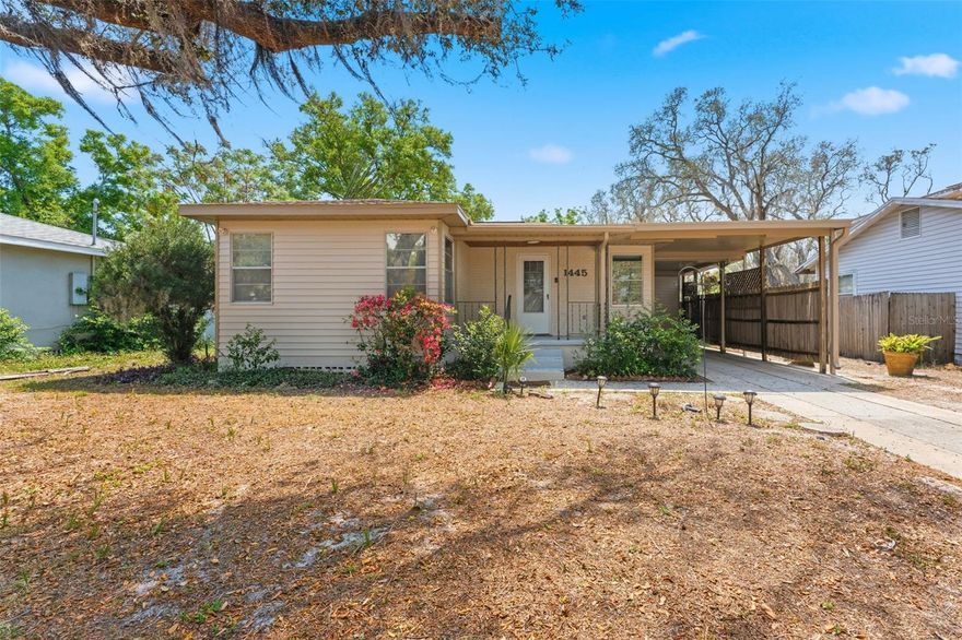 Welcome to a charming and well-maintained 2-bedroom, 2-bathroom pool home offering 955 square feet of comfortable living space, perfectly situated on a generous .18-acre lot in a high and dry location outside of a flood zone while still being just a short drive from the award-winning shores of Clearwater Beach. This delightful single-family residence greets you with inviting curb appeal, highlighted by a quaint front porch and a covered carport that provides convenient parking along with additional storage space at the rear. Inside, you are welcomed into a warm and inviting living room featuring beautiful original hardwood floors that add character and charm, seamlessly flowing into the dining area and an updated kitchen designed to impress with bright LED can lighting, crisp white shaker-style cabinetry, newer stainless steel appliances, and sleek 12x24 modern tile flooring. Both bedrooms are generously sized and continue the timeless appeal with stunning hardwood floors, offering ample closet space and room for a variety of furniture layouts, while a full bathroom with a tub/shower combination is conveniently located between them. Just off the kitchen, a versatile bonus room provides endless possibilities as a second living area, home office, den, or fitness space, complete with sliding glass doors that open to your own private outdoor retreat. The backyard is truly an entertainer’s dream, featuring a large kidney-shaped pool surrounded by a fully fenced and private setting, along with multiple wooden deck spaces including a covered area for shaded relaxation and an open-air deck ideal for dining and gatherings. A pavered section in the corner creates the perfect spot for a cozy fire pit, while a storage shed adds extra functionality. Enhancing the outdoor experience even further is a detached bathroom equipped with a toilet, sink, and shower, offering ultimate convenience without needing to re-enter the home while enjoying the pool and backyard. Recent updates provide peace of mind, including an AC unit replaced in 2020, a new roof installed in 2022, and a freshly painted exterior completed in 2026. Ideally located in the heart of Clearwater, this property provides easy access to top-rated dining, shopping, and entertainment throughout the Tampa Bay area, and is just a short drive to both Tampa International Airport and St. Pete-Clearwater International Airport, making it an exceptional opportunity for full-time living, a vacation retreat, or an investment property offering minimum 30 day lease.  Last tenants will vacate on August 1st, 2026 as traveling nurses occupy until then and seller can not cancell their contract.