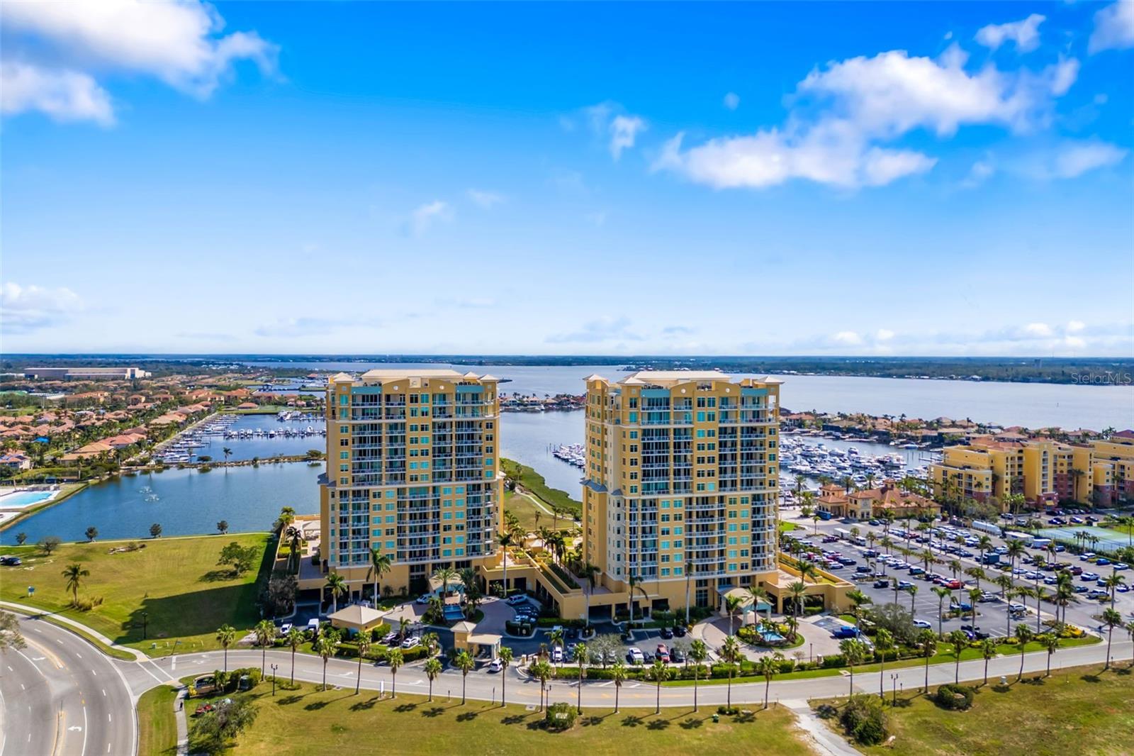 One or more photo(s) has been virtually staged. Welcome to Bel Mare at Riviera Dunes, one of the most luxurious condo communities in the area. Your new home awaits on the 12th floor, accessible by your private elevator. This exceptional 3-bedroom condo offers breathtaking water views and an open floor plan, perfect for both relaxation and entertaining. Floor-to-ceiling windows in the living area showcase stunning vistas of the marina and Manatee River. The condo features three bedrooms, each with its own ensuite bathroom, ensuring privacy and comfort for all. A separate den/office and a powder room provide additional flexibility. The upscale kitchen is a chef's dream, boasting granite counters, stainless steel appliances, solid wood cabinets, and ample space for culinary creativity. The split floor plan creates a secluded primary suite with its own balcony access, a spacious bathroom with dual sinks, a walk-in tile shower, a separate tub, and two walk-in closets. Two additional bedrooms, each with a full bathroom, and a den/office with balcony access complete the interior. Step onto your 44' balcony and immerse yourself in the beauty of the surrounding area. The condo also includes a full laundry room with a sink, a deeded garage parking space, a storage unit, and access to extra community parking. Bel Mare offers world-class amenities, including three pools, a spa, a fitness center, a movie theater room, a billiards lounge, outdoor grills, marina and restaurant access, and much more. You'll also have access to the Marriott Resort and Spa Beach Club next door. Located centrally with easy access to I-75, Tampa, St. Pete, Sarasota, and Florida's renowned beaches, this is an opportunity not to be missed. Schedule your showing today!