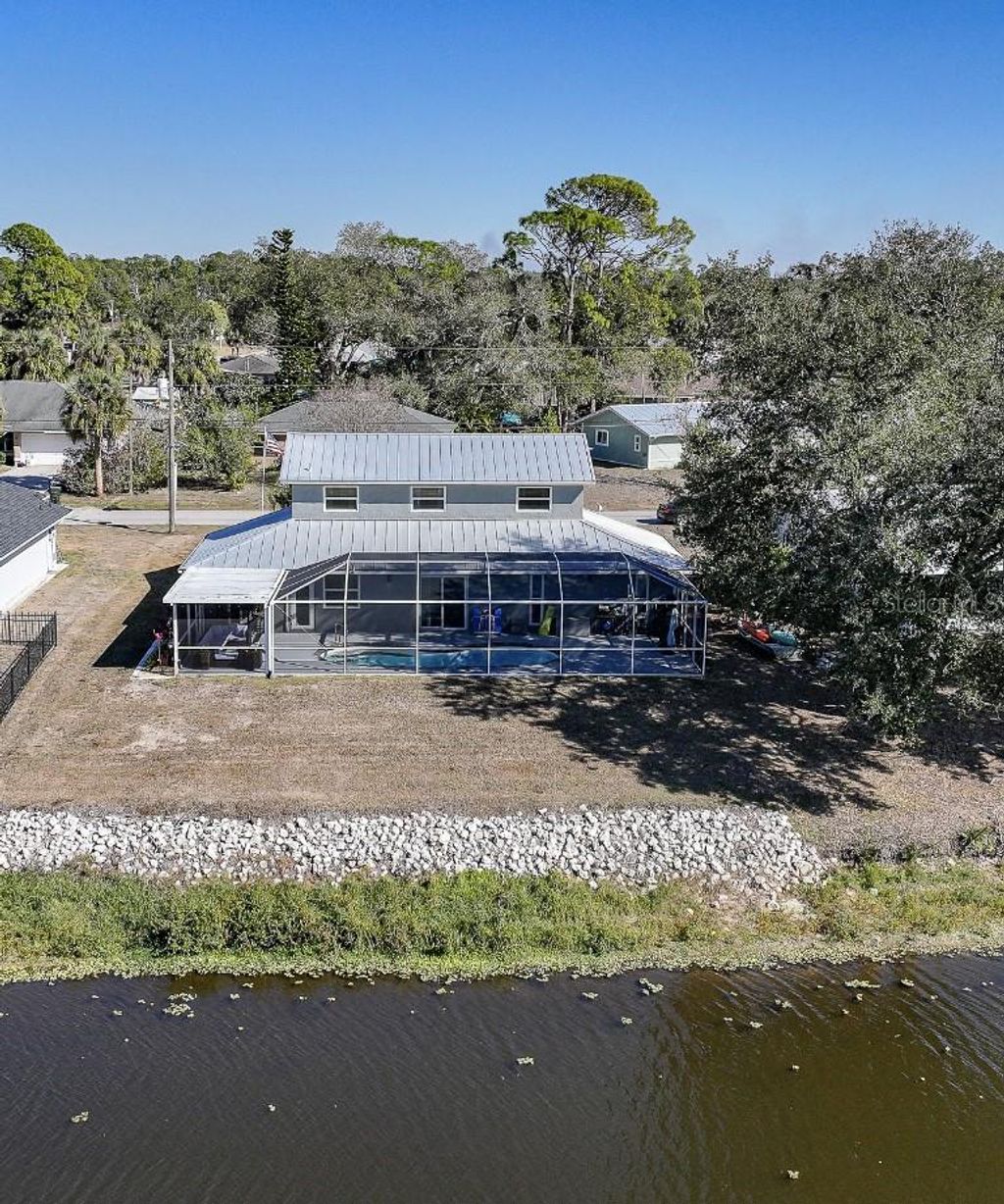 Photo of 4053 Pinstar Terrace, North Port, FL 34287 (MLS # TB8474805)