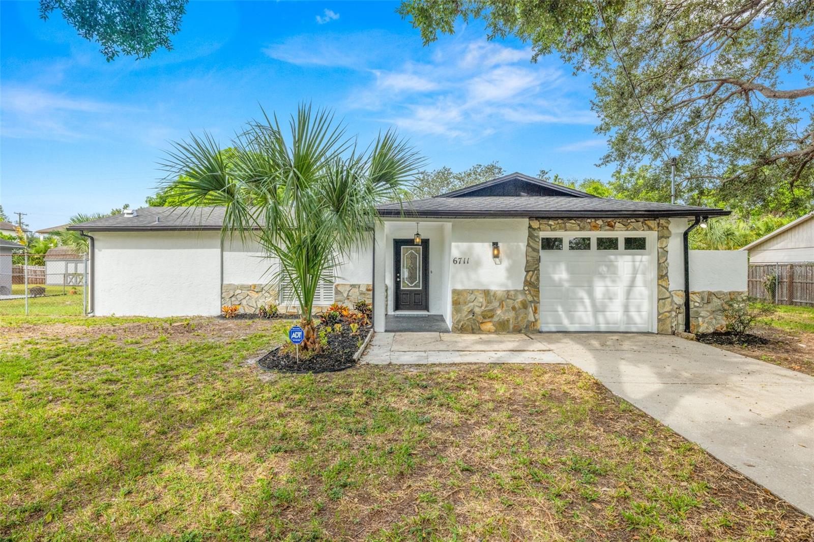 Welcome to 6711 S Englewood, a fully renovated home situated on an oversized 120x110 lot in the highly sought after neighborhood of South Tampa. Set apart from many homes in the area, this property is located in Flood Zone X, giving you a prime South Tampa address without the added expense of flood insurance. This 3-bedroom, 2-bath residence features quartz countertops, luxury vinyl flooring, and brand-new stainless steel appliances, offering a modern and move-in ready living experience. Additional peace of mind comes with a newer water heater (2019) and AC system (2020). The prime location provides convenient access to the upcoming Interbay Commons development, as well as a short drive to the Westshore Marina District, Downtown Tampa, and Downtown St. Petersburg. With major redevelopment plans underway at both Westshore Plaza and Britton Plaza, the surrounding area is poised for exciting growth and added value. Combining thoughtful updates with a rare oversized lot and ideal location, this home presents a unique opportunity in the heart of South Tampa.