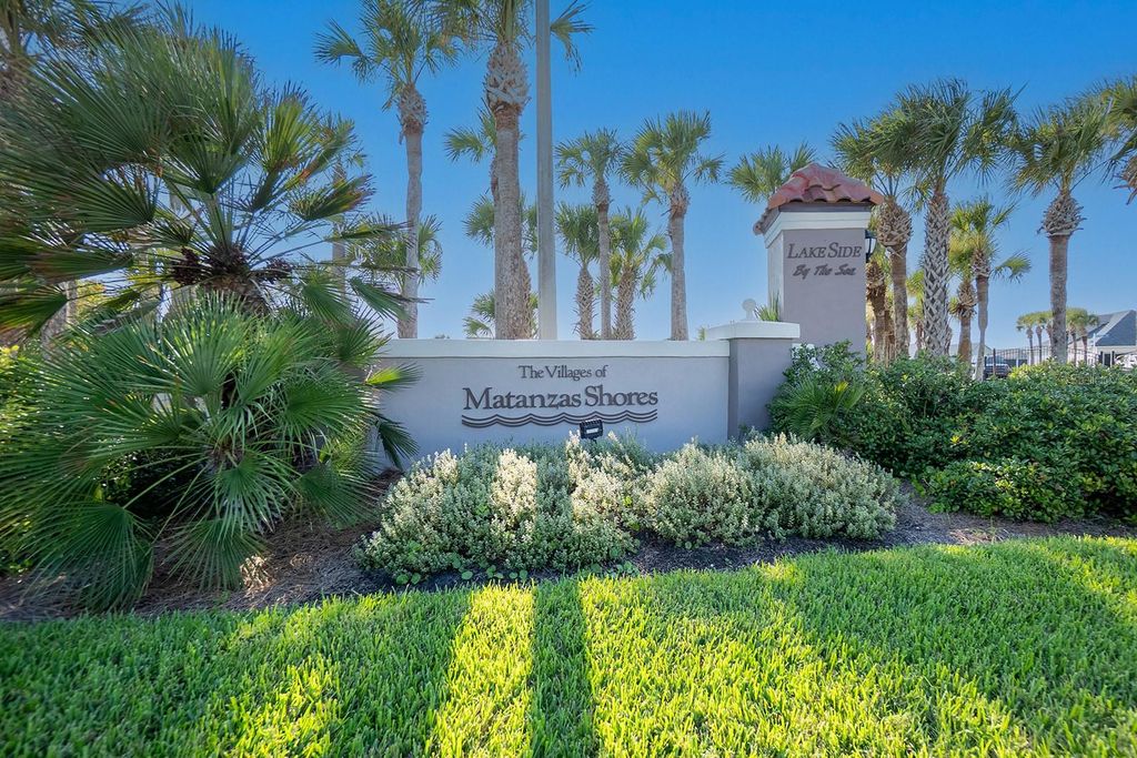 Photo of 9 Los Lagos Boulevard, Palm Coast, FL 32137 (MLS # FC312925)