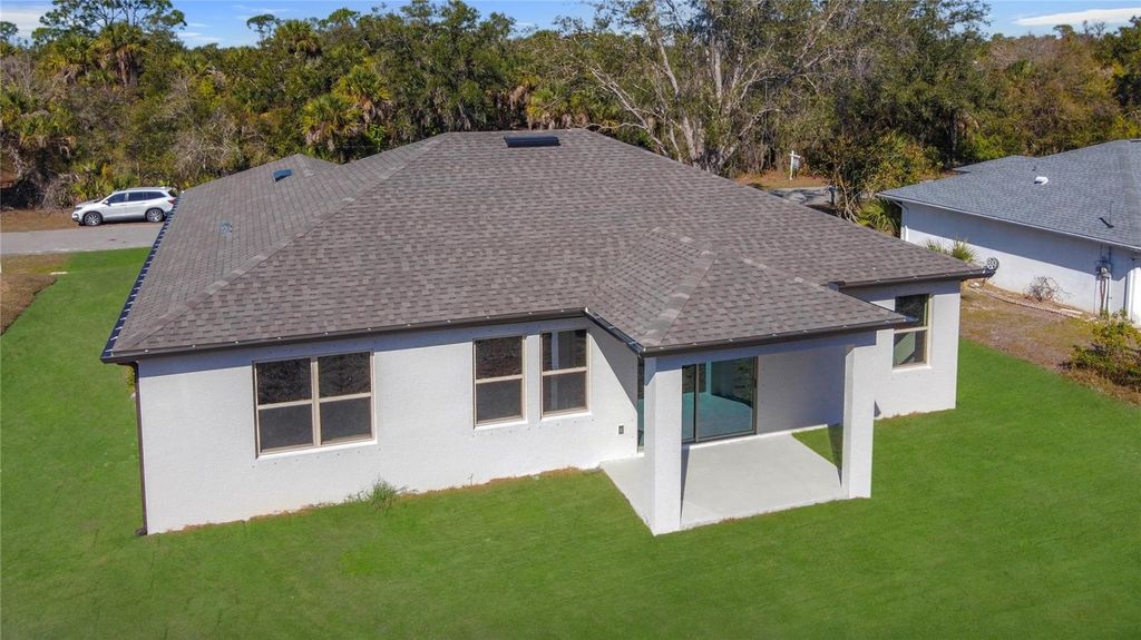 Photo of 2843 S Chamberlain Boulevard, North Port, FL 34286 (MLS # TB8501482)