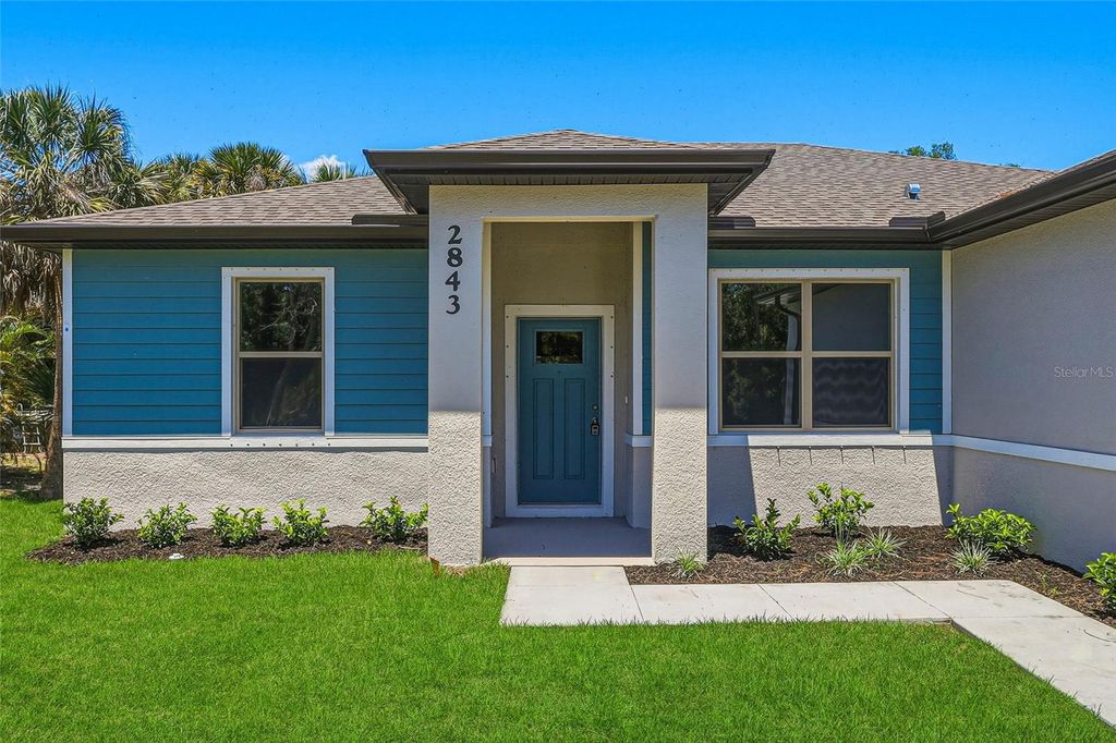 Photo of 2843 S Chamberlain Boulevard, North Port, FL 34286 (MLS # TB8501482)