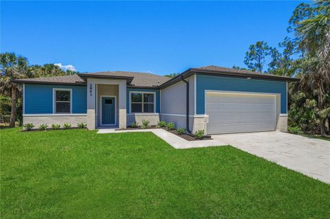 Photo of 2843 S Chamberlain Boulevard, North Port, FL 34286 (MLS # TB8501482)