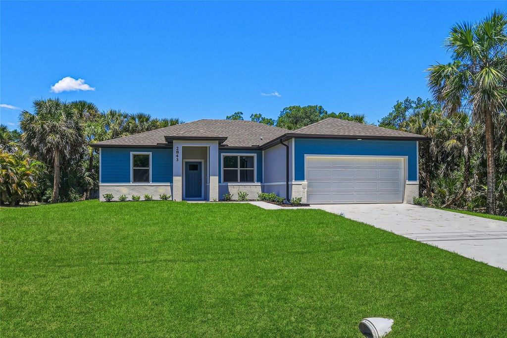 Photo of 2843 S Chamberlain Boulevard, North Port, FL 34286 (MLS # TB8501482)