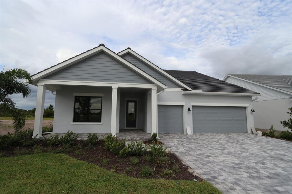 Photo of 18003 Foxtail Loop, Venice, FL 34293 (MLS # TB8421191)