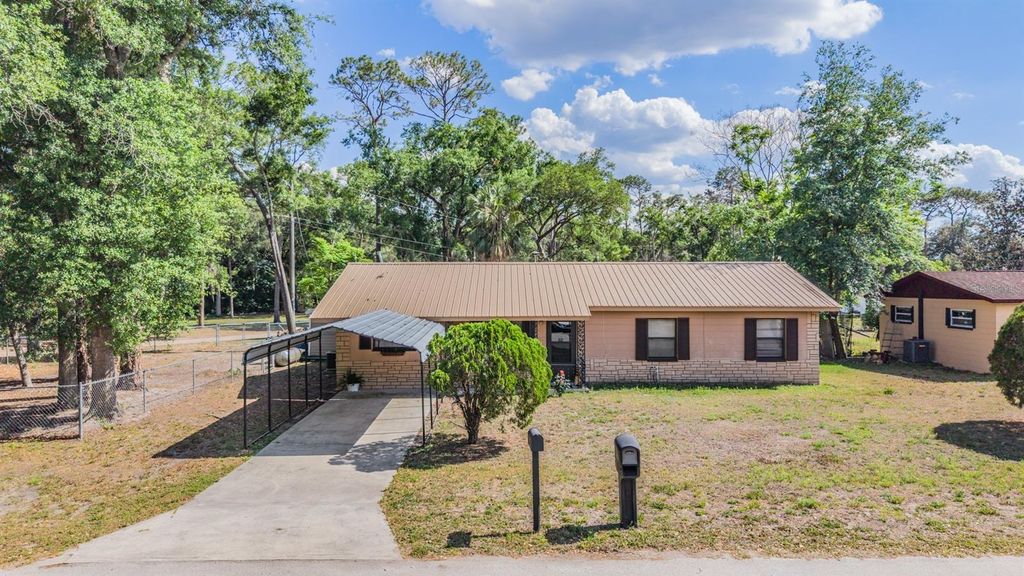 Photo of 39048 Blue Jay Avenue, Zephyrhills, FL 33542 (MLS # TB8501656)
