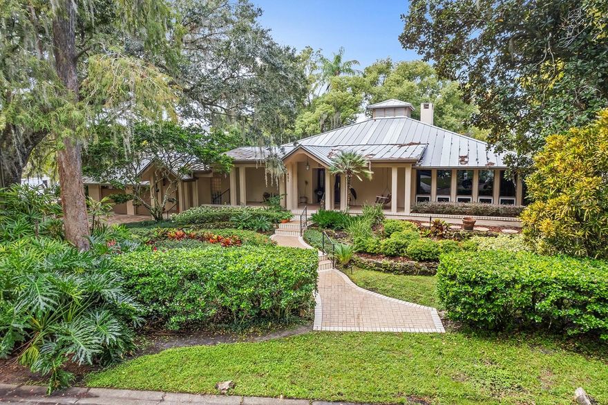 Discover a once-in-a-lifetime chance to own nearly a half acre of prime lakefront property on Lake Maitland, the largest of the Winter Park Chain of Lakes. Nestled in a serene alcove, this secluded setting is surrounded by multimillion-dollar homes and new custom construction, offering endless possibilities for creating your dream estate. The value of this property lies in the land, making it the perfect canvas for designing the ultimate lakefront retreat. Renovate the existing home or start fresh to craft a residence that meets your every desire. A covered boat dock with lift ensures easy access to the Chain of Lakes, where you can enjoy boating, waterskiing, wakeboarding, paddleboarding, and fishing. The property also features a lakeside pool with spa and a concrete seawall to protect and enhance your waterfront experience. This tranquil neighborhood is graced with towering oak trees and winding roads that create a picturesque setting. Located just minutes from downtown Winter Park, you’ll enjoy fine dining, boutique shopping, and cultural experiences along Park Avenue. The property is zoned for top-rated public schools and conveniently close to everyday necessities. Lake Maitland is not just a home — it’s a lifestyle. A short boat ride takes you to the Winter Park Racquet Club, a premier destination for dining and social events. Don’t miss this extraordinary opportunity to embrace the luxury and leisure of lakefront living on the prestigious Winter Park Chain of Lakes.