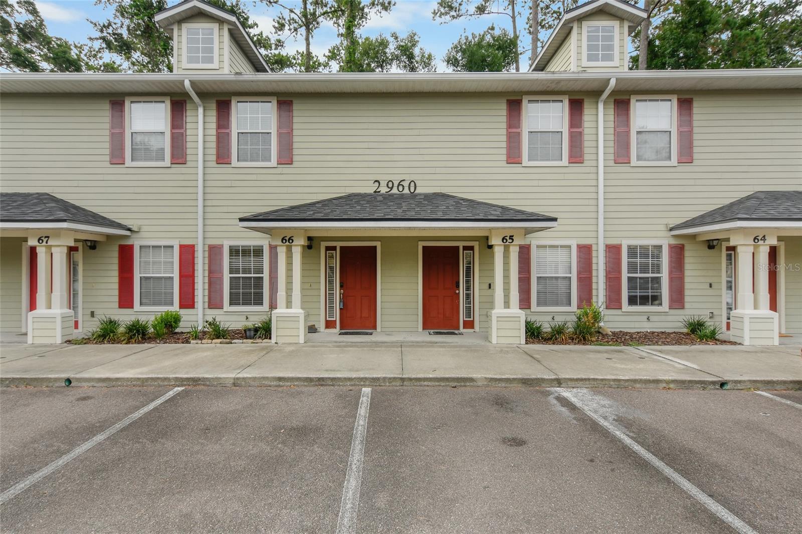 Upgraded condo near the University of Florida and UF Health Shands Hospital with 2 bedrooms, 3 bathrooms, and a flexible office space! This two-story floor plan includes a tiled living area and a modern kitchen with granite countertops and upgraded appliances. Upstairs, both bedrooms have their own full bathrooms and large closets. Downstairs, there’s an additional room with a full bathroom and closet - perfect for a guest room or home office. Located in the newest phase of the community, this unit features higher ceilings, granite in both the kitchen and bathrooms, a larger living room, and a more spacious downstairs office/guest room. Tile and simulated wood flooring throughout - no carpet! The community includes a pool, two nearby bus stops to campus, and quick access to shopping, the University of Florida, and UF Health Shands Hospital. Plus, the refrigerator and microwave are less than a year old!