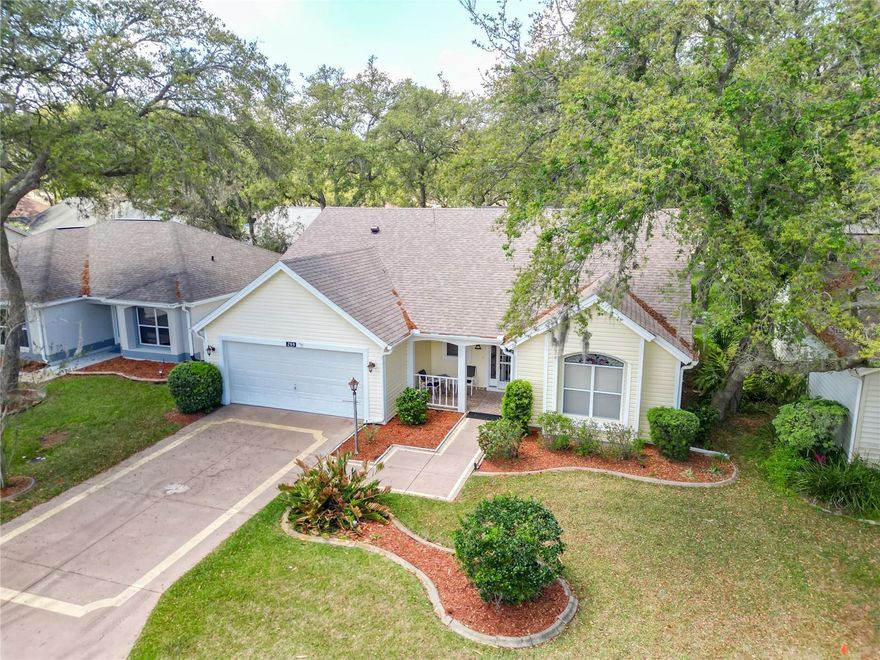 Turn-key and fully furnished, this charming Monterey Model is move-in ready and ideally situated on a quiet cul-de-sac in the highly sought-after 55+ community of The Villages, Florida. Featuring 2 bedrooms and 2 bathrooms—with the added flexibility of a Murphy bed—this home offers a perfect balance of comfort, functionality, and style.  Recent updates provide peace of mind, including a new HVAC system (2024), new roof (2025), and new hot water heater (2025). Inside, the open and inviting floor plan showcases vaulted ceilings, engineered wood and tile flooring, and a solar tube that fills the home with natural light.  This bright, cheerful kitchen is equipped with Corian countertops, ample cabinetry, and a convenient breakfast bar, along with a dedicated dining area ideal for hosting family and friends. The enclosed private lanai offers a tranquil space to enjoy your morning coffee or unwind at the end of the day.  The spacious primary suite features dual walk-in closets, a double vanity, and a private ensuite bath designed for comfort and convenience. Additional highlights include an indoor laundry room with pedestal washer and dryer, built-in storage, and a golf cart—perfect for embracing The Villages’ active lifestyle.  Beautifully maintained and thoughtfully updated, this home is a rare opportunity to enjoy relaxed, resort-style living in a peaceful setting.