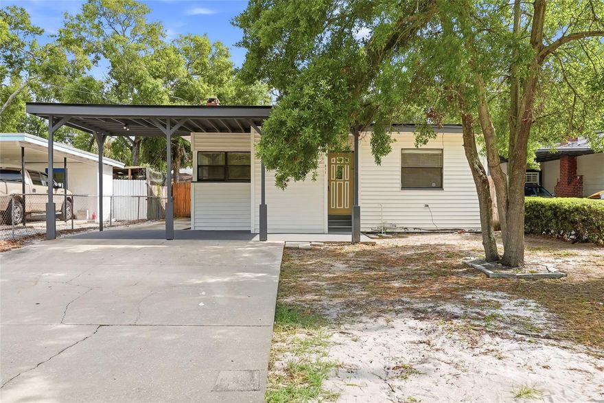 Welcome to this charming four-bedroom, two-bath home in Downtown Clearwater, perfectly situated just minutes from the beaches, shopping, and public transportation. Step into a spacious living room featuring a cozy wood-burning fireplace ideal for relaxing evenings and stylish laminate flooring that runs throughout the main living areas, offering both durability and a modern aesthetic and offers sliding glass doors that provide seamless indoor-outdoor living. The home also includes a dedicated dining room and a comfortable family room, providing plenty of space for entertaining and everyday living.The eat-in kitchen opens conveniently to the main living space and is equipped with stainless steel appliances, ample cabinetry, and a functional layout that makes cooking and gathering a breeze. A pass-through with glass shelving adds a unique architectural touch while keeping the space bright and connected. The primary bedroom with attached en-suite bathroom features a glass-enclosed shower and a built-in closet for practical storage. Additional spacious bedrooms with ceiling fans and shared fully bathroom. Step outside to enjoy a large fenced-in backyard—perfect for pets, gatherings, or simply relaxing outdoors complete with a spacious deck and a convenient storage shed for all your tools and equipment.This home combines comfort, convenience, and location—making it a fantastic opportunity in the heart of Clearwater.