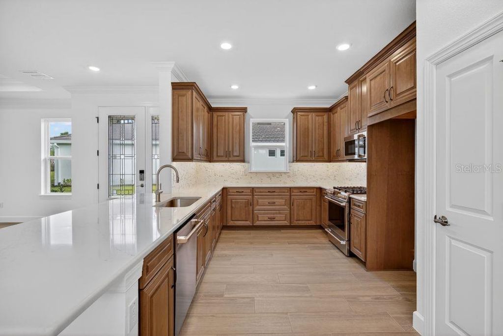 Photo of 3909 Fraccareta Way, Wesley Chapel, FL 33543 (MLS # TB8487458)