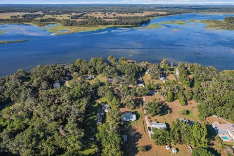 Photo of 6985 W Riverbend Road, Dunnellon, FL 34433 (MLS # OM711801)