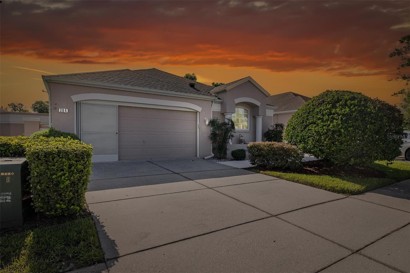 Discover the perfect blend of comfort, style, and convenience in this beautifully maintained 3-bedroom, 2-bathroom, 2-car garage home located in the desirable gated community of Seven Hills. With NO AGE RESTRICTIONS, a low HOA, and no CDD fees, this home offers an exceptional lifestyle in a prime location. As you enter, you'll be greeted by tall vaulted ceilings and multiple skylights that bathe the home in natural light, creating a bright and uplifting atmosphere. The thoughtfully designed split bedroom plan ensures maximum privacy, making it ideal for families, guests, or multi-generational living. The heart of the home is a spacious tiled kitchen featuring ample cabinetry and a sunny eat-in area, perfect for casual dining. A formal dining room with a unique chandelier adds a touch of elegance for special occasions and entertaining. Relax in the expansive living room with built-in shelving, offering both style and function, and unwind in the large screened lanai—your personal retreat for enjoying quiet mornings or hosting gatherings with ease. The primary suite is a peaceful haven, complete with a large walk-in closet and a well-appointed en-suite bathroom featuring dual sinks and a tiled walk-in shower. The third bedroom boasts French doors, making it an ideal office, guest room, or creative space to fit your lifestyle. Additional features include an indoor laundry room with washer and dryer included and a brand-new roof for peace of mind. Located just minutes from shopping, restaurants, medical facilities, the YMCA, and the Suncoast Parkway, this home offers easy access to Tampa and points north—all while enjoying the tranquility of a gated community. Don’t miss out—schedule your private showing today and make this exceptional home yours!