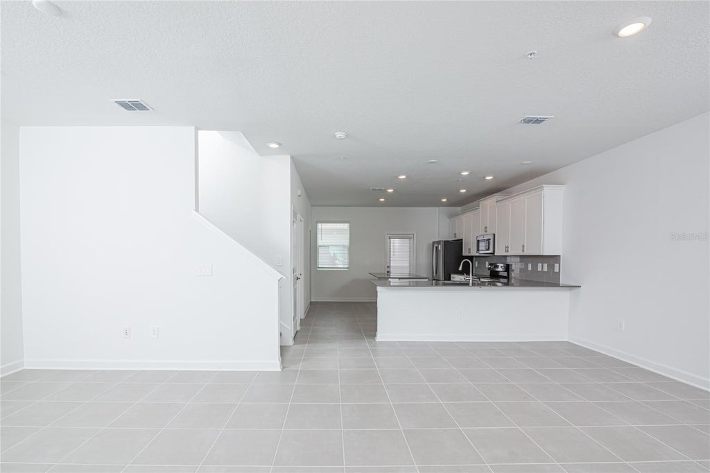 Photo of 11275 Listening Drive, Orlando, FL 32832 (MLS # O6430673)