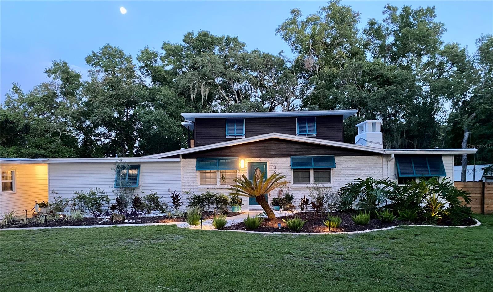 Discover this charming custom home nestled in the peaceful and highly desirable Lake Mary community, offering the rare benefit of no HOA fees. Built in the 1960s, this inviting two-story residence features four spacious bedrooms and three full bathrooms, providing plenty of room for family and guests. Inside, you'll find thoughtfully designed built-in cabinets for ample storage, along with a versatile den or office space—ideal for working from home or unwinding. Warm and welcoming hardwood floors, vintage holdouts, entertaining galore!
The recently renewed kitchen showcases beautiful butcher block countertops, seamlessly combining functionality with rustic charm. Step outside to enjoy the oversized backyard pool, perfect for summer days and relaxing evenings. Sitting on a generous one-acre lot, there's plenty of space for outdoor activities, gardening, or simply enjoying the tranquility of the surroundings.
Additional highlights include a separate two-car garage and a flexible upstairs bonus room, offering extra space for hobbies or a home office. This home blends artistic touches with modern conveniences, creating a warm and inviting atmosphere for your next chapter.