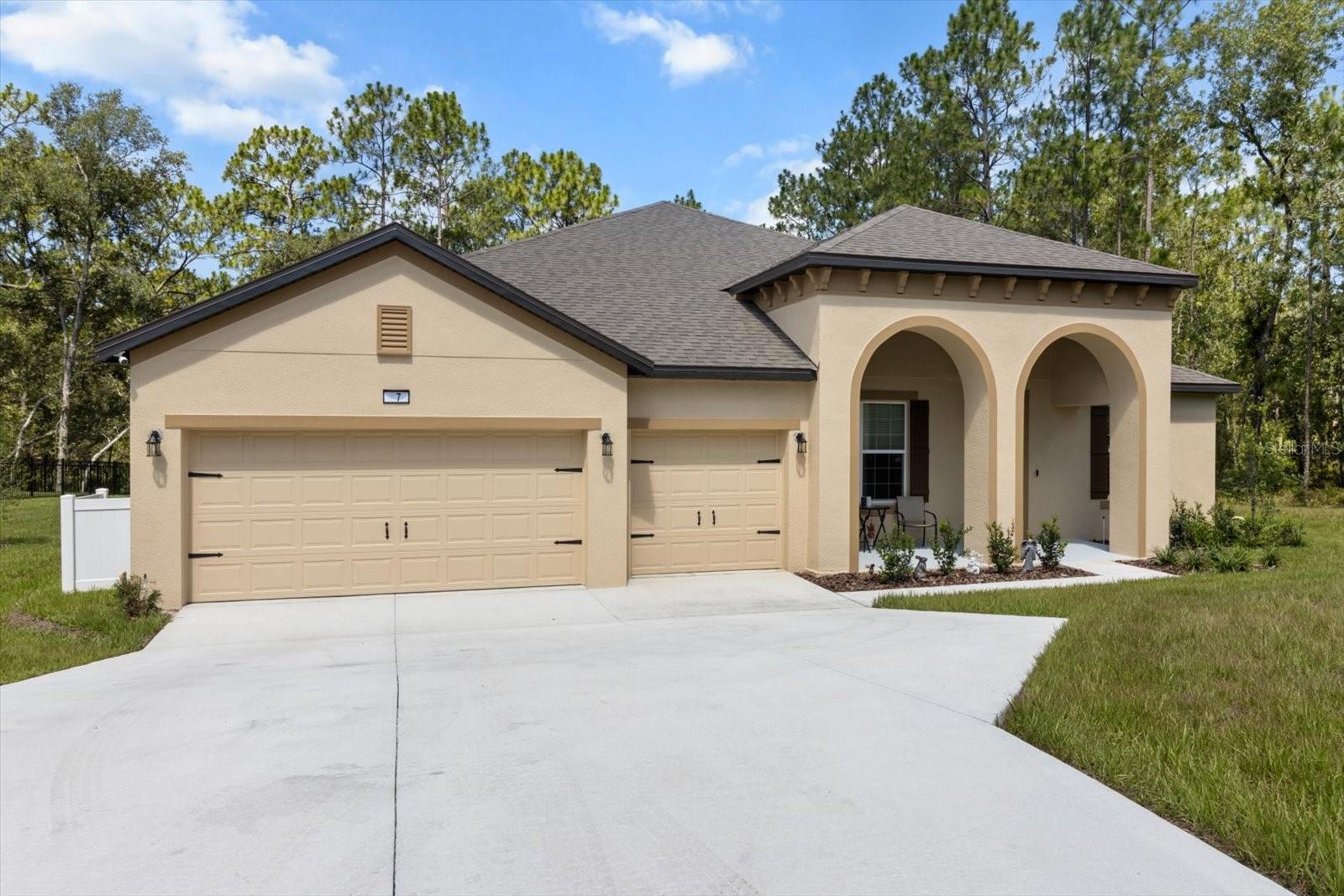 Just Built in 2025! Stunning 4 Bed + Office, 3 Bath Home by Maronda Homes | Over $100K in Upgrades! Welcome to luxury living in the sought-after Oak Village of Sugar Mill Woods! This brand-new 2025 Maronda-built home offers an expansive 3,089 square feet of living space, featuring 4 spacious bedrooms, 3 full bathrooms, and a dedicated home office — perfect for working remotely or creating a quiet flex space. Every detail has been carefully curated with over $100,000 in premium builder upgrades. Enjoy beautiful tile flooring throughout. This home features all upgraded stainless steel appliances and a spacious open floor plan thoughtfully designed for comfortable, modern living. Additional highlights include a full home theater package, a smart home system with integrated security, elegant crown molding, and a screened-in patio equipped with ceiling fans—perfect for entertaining friends and family at weekend BBQs. There's even room to add a pool and customize your outdoor space further. And with too many upgrades to list, this home must be seen in person to be fully appreciated. Located on a peaceful street in Oak Village, this home combines new construction peace of mind with the natural beauty and charm of Sugar Mill Woods. This home truly has it all — style, space, functionality, and location. Call today to schedule your private tour and experience everything this stunning new build has to offer!