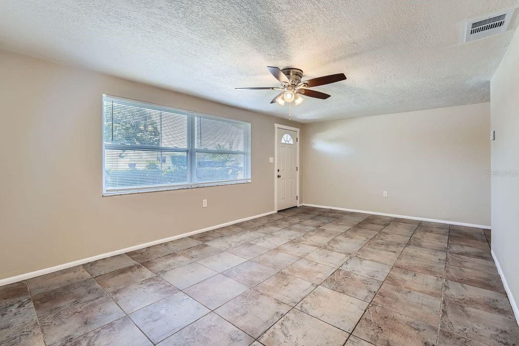 Photo of 3629 Rosewater Drive, Holiday, FL 34691 (MLS # O6362733)