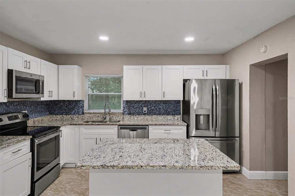 Photo of 1339 E Jackson Avenue, Mount Dora, FL 32757 (MLS # O6435132)