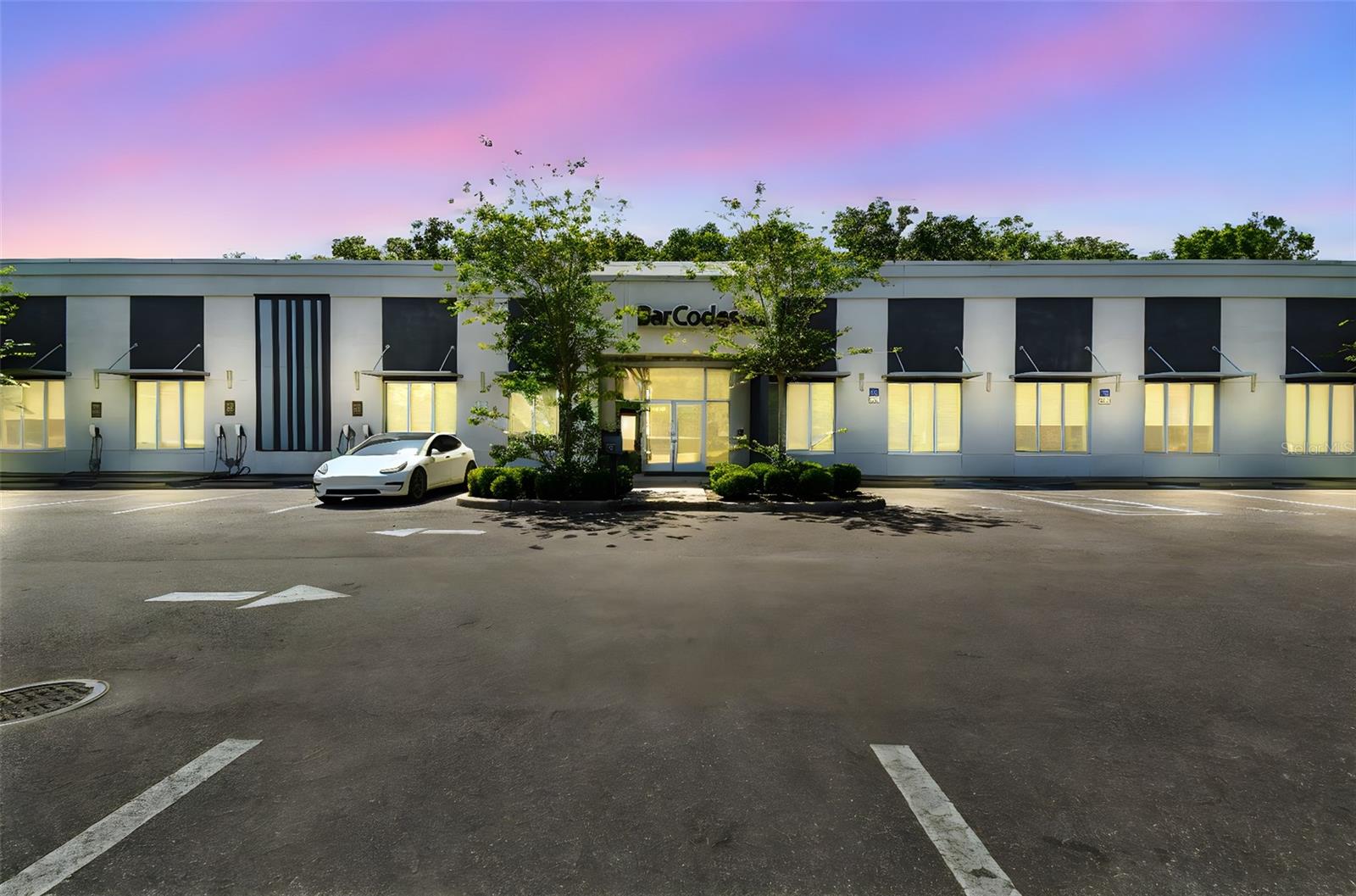 Ideally located in the rapidly growing City of Brooksville, 924 Hale Avenue is a best-in-class office asset that combines modern construction, high-end finishes, and exceptional versatility. Zoned C-2 (Highway Commercial), the property supports a broad range of commercial uses—including professional office, medical, retail, service-oriented businesses, and even light industrial or distribution—making it a highly adaptable opportunity for investors and end users alike.
Whether intended for an investor, owner-user, or co-working operator, this property offers a uniquely versatile opportunity.
The property can be delivered with existing co-working tenants in place for immediate income, or delivered vacant, offering a seamless conversion opportunity for a corporate headquarters or owner-user.
Key Property Features
10,152 SF Modern Office Building
3.11-Acre Parcel | Zoned C-2 (Highway Commercial)
Built in 2019 | Full concrete block construction with hurricane-impact windows
Ample Onsite Parking
Dedicated loading dock and overhead door, offering rare back-of-house functionality for deliveries, storage, or conversion to flex/warehouse use
Full Solar Array | Significantly reduces operational utility costs
Electric Vehicle Charging Stations
Upscale Fitness Center, Communal Kitchen, and Lounge Areas
High-Speed Fiber Internet, Secure 24/7 Access
Flexible Use Potential
The building’s open and adaptable layout allows for a mix of private offices, conference rooms, open desk/co-working areas, and specialty buildouts.
The C-2 zoning allows for a wide range of permitted uses, including:
Professional & Medical Offices
Retail and Showroom
Restaurant or Café
Personal Services & Fitness Studios
Light Auto Services or Distribution
Hospitality & Lodging
Current ownership passively operates the property as Hernando Coworking, which offers a turn-key coworking model with tremendous value-add potential. REGUS has expressed interest in taking over operations, offering investors an immediate path to stabilized passive income.
Expansion & Development Opportunity
The expansive 3.11-acre site offers ample room for future development, such as additional office structures, retail pads, or even a flex/industrial component.
Strategic Location
Located just ½ mile from Broad Street (US-41) and ¾ mile from Jefferson Street (SR-50), this property benefits from excellent access and visibility. The surrounding area has seen an influx of residential and commercial development, with strong demographic and infrastructure trends supporting long-term demand.