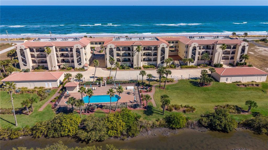 Photo of 2450 N Ocean Shore Boulevard #116, Flagler Beach, FL 32136 (MLS # NS1087221)